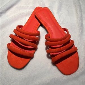 Bright orange strap flat sandals